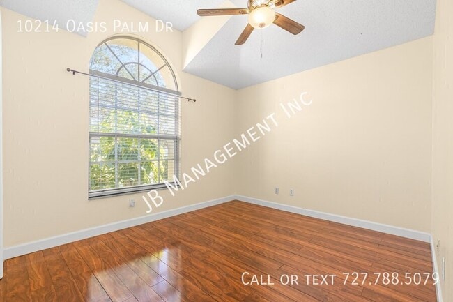 Building Photo - 10214 Oasis Palm Dr