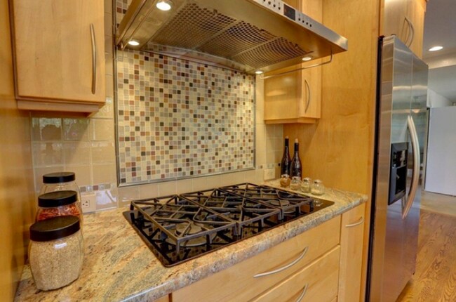 Building Photo - Executive 5BR Home with Private Backyard Retreat