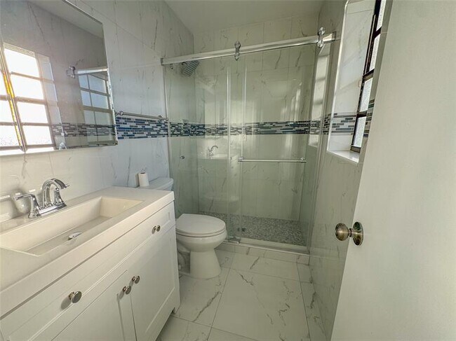 Building Photo - 10687 Royal Palm Blvd