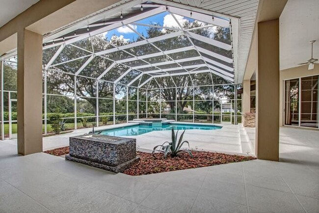 Building Photo - Stunning 5-Bedroom Pool Home on Nearly 2 A...