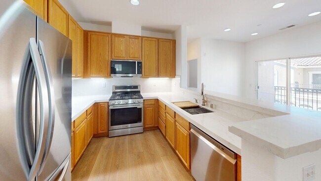 Building Photo - Modern 2BR/2BA Rancho Cucamonga Condo with 2 Balconies & 2-Car Garage – No Carpet!