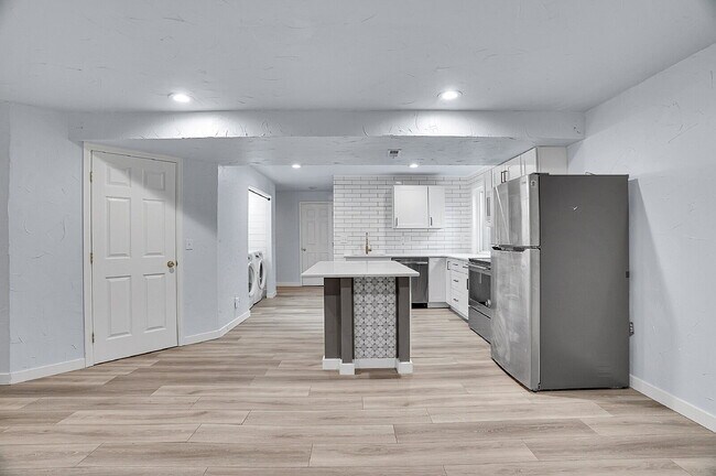 Building Photo - $3,295.95 - 3 bed, 2 bath updated Home in Littleton with Two Full Kitchens and Impressive Yard!