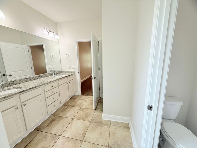 Building Photo - Spacious 5-Bedroom Home - Heart of Pace