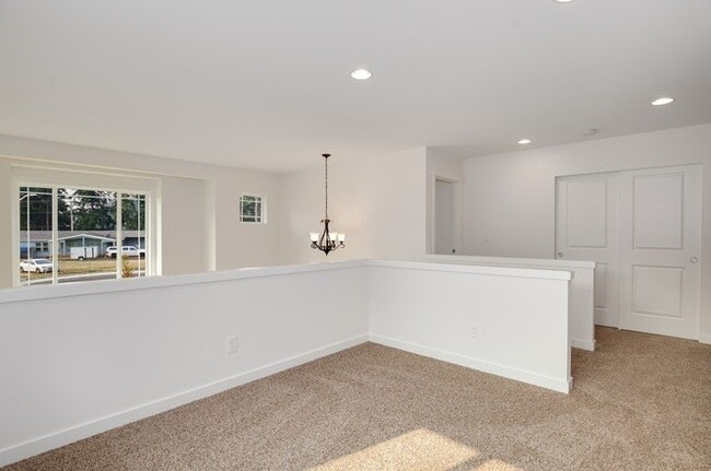 Building Photo - Modern Luxury: Spacious 3-Bedroom Home Near JBLM