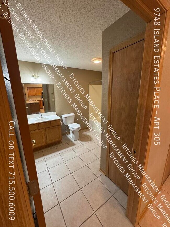 Building Photo - 9748 Island Estates Pl