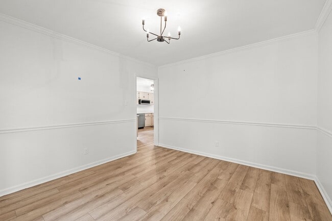 Building Photo - Renovated Home on Large Corner Lot in Coveted Strathy Hall
