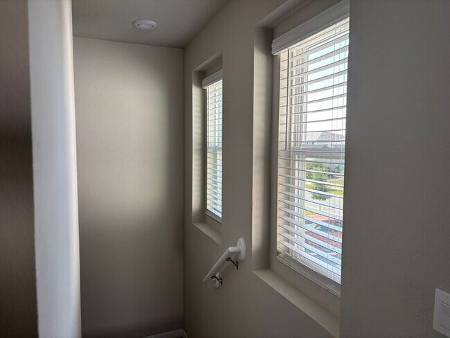 Building Photo - Like-New 4 Bedroom 3 Bath with Pond View & Two Living Spaces — Minutes to South Lake Nona