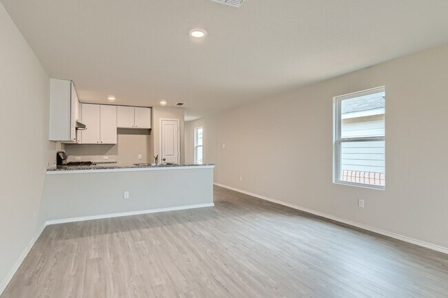Building Photo - Beautifully Designed4-Bedroom Home with Open-Concept Living in a Prime Location