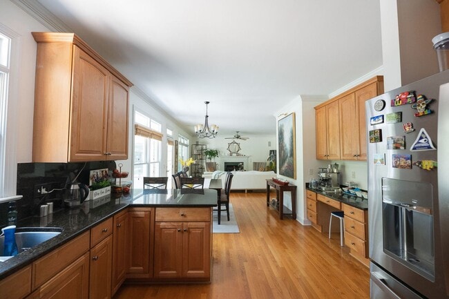 Building Photo - Spacious & Striking 3-story brick Executive 4 bedroom 4.5 bathroom home in Oak Ridge NC + Lawn ca...