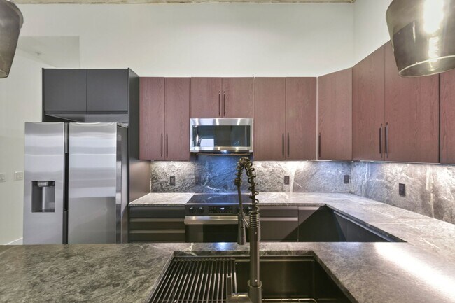 Building Photo - Modern Industrial Loft in the Heart of EADO!
