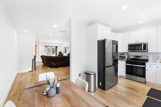 Building Photo - Movie in special, first 1/2 month rent is FREE! Charming 2-Bedroom Condo with 2 Full & 2 Half Bat...