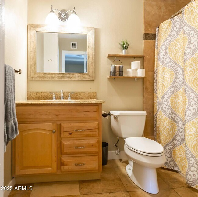 Building Photo - 8447 E Sheridan St