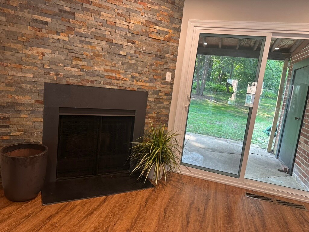 Brick Fireplace Centerpiece • Cozy Winter Ambiance • Warm, Inviting Living Space - 55 Providence Ave