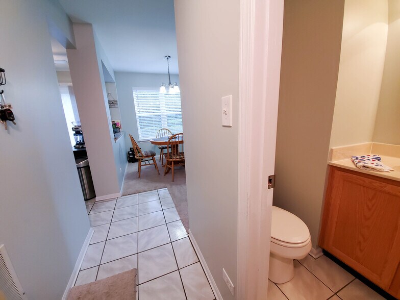 Powder room off kitchen - 344 S Lancelot Ln