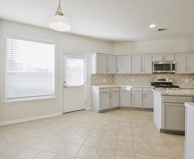 Building Photo - 6614 Halcyon Days Dr