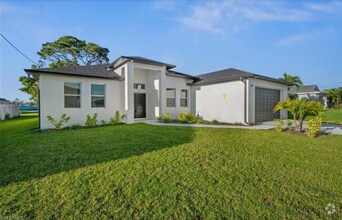 Building Photo - Home in Cape Coral – Modern Design. 1 mont...