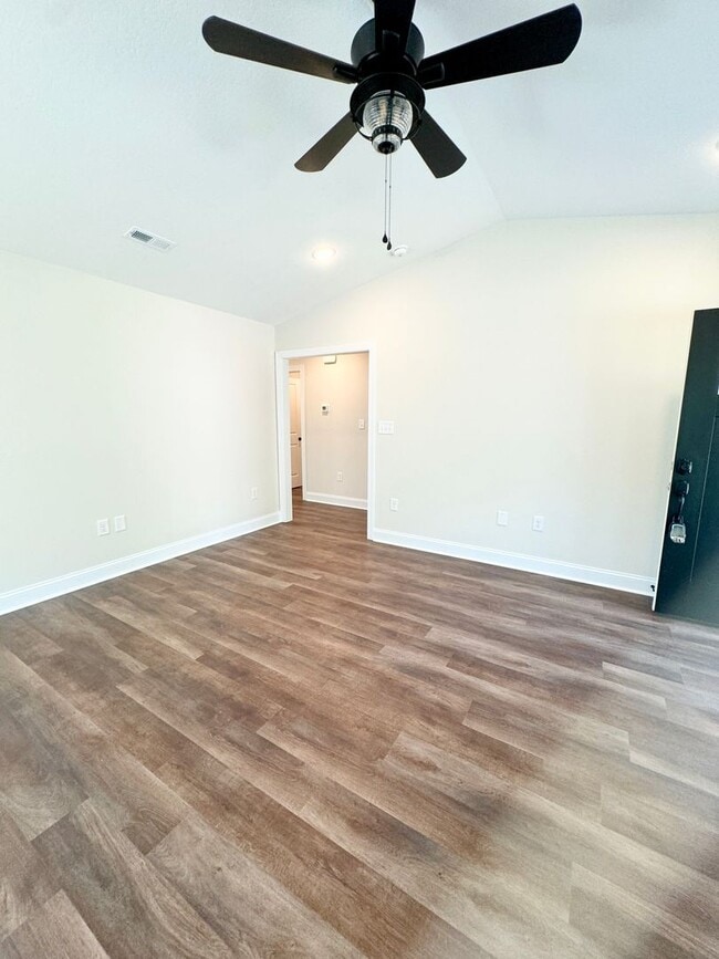 Building Photo - BEAUTIFUL pond front home! All the details make this a showstopper.! Fenced Yard!!