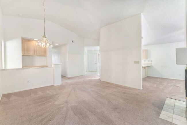 Building Photo - Vaulted Ceilings, Cozy Fireplace & Desirable Single-Story Living Near The Lakes!
