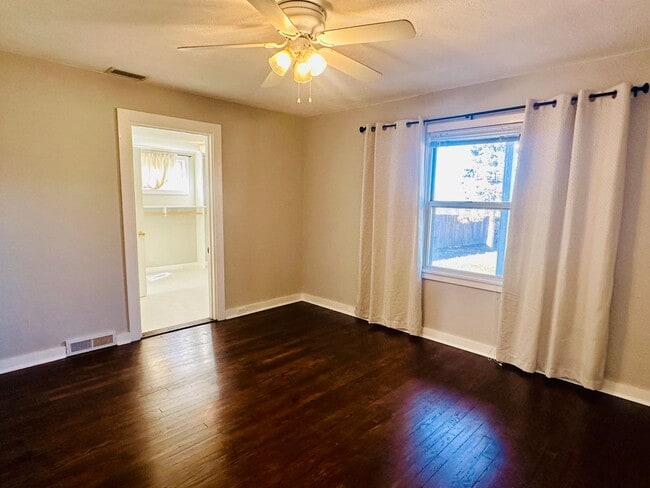 Building Photo - {8520} Charming Four Bedroom in Fantastic Location + Two Main Floor Bedrooms + Hardwood Floors + ...