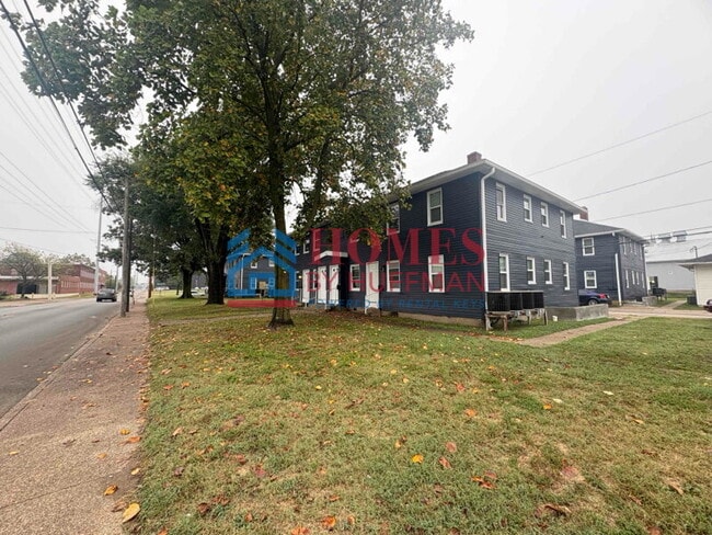 Building Photo - One Bedroom Apartment | Laundry Facility | Utilities Included