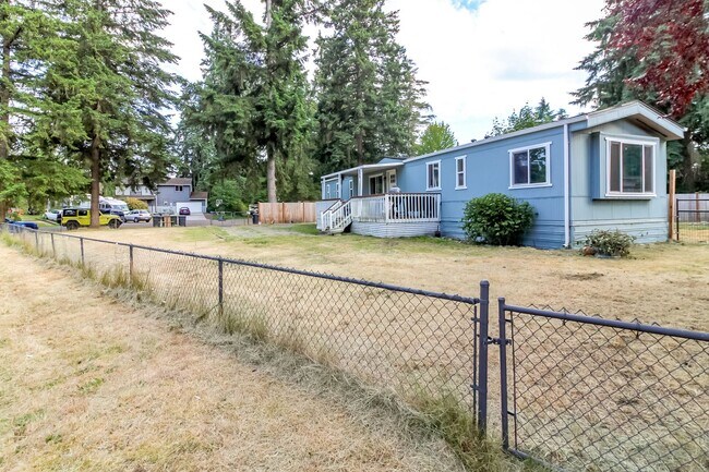 Building Photo - Updated 2 bedroom manufactured home on large corner lot