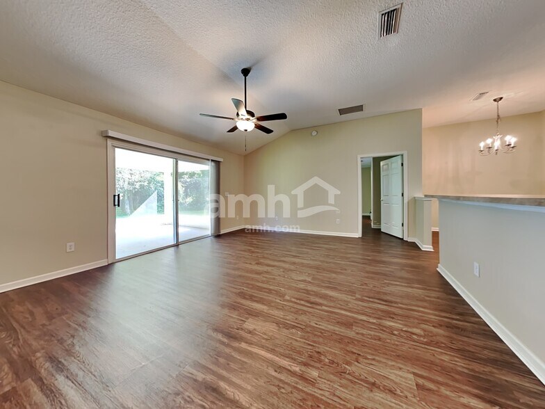 Building Photo - 7152 Rapid River Dr N
