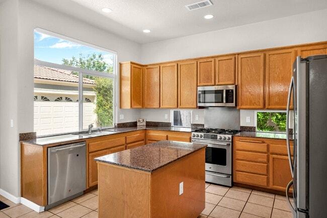 Building Photo - Move-In Ready 4-Bed, 3-Bath Gem in a Covet...