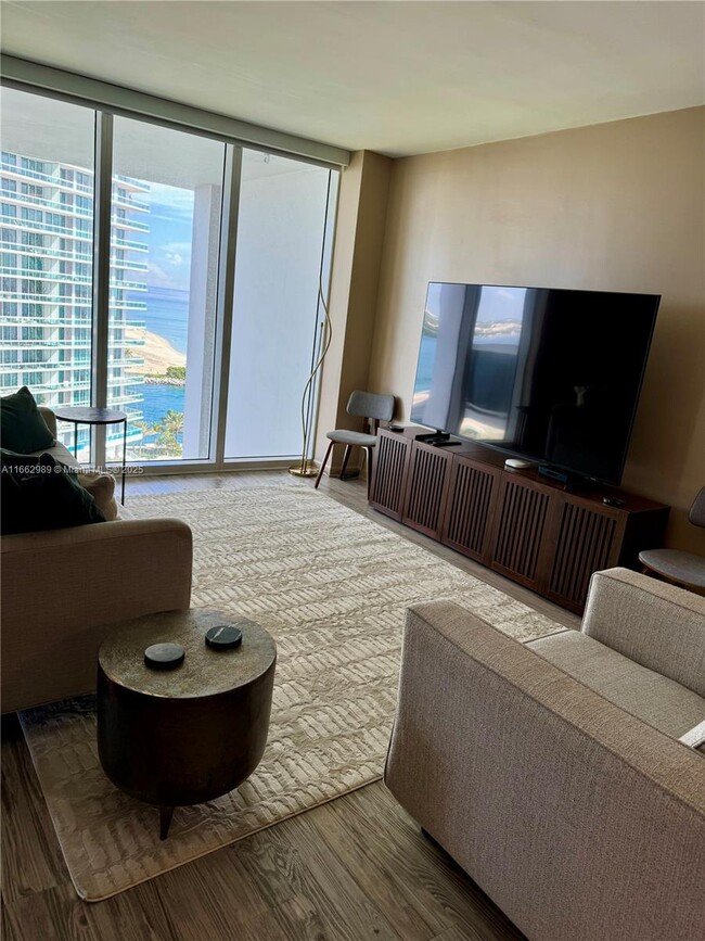 Building Photo - 10275 Collins Ave