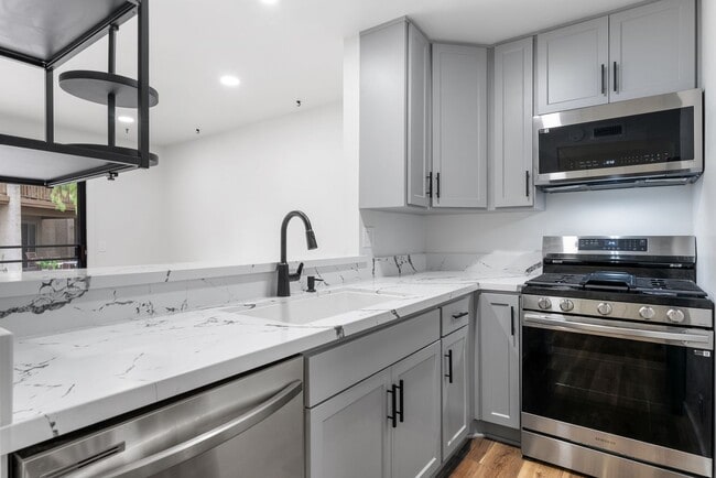 Primary Photo - Renovated 1 Bedroom Condo Overlooking Creek
