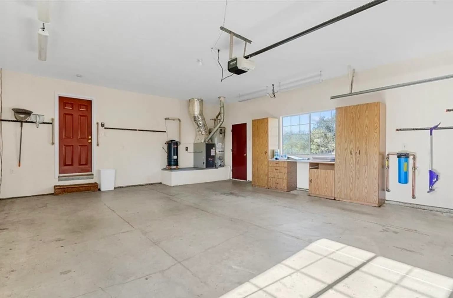 Oversized two car Garage (note: cabinetry has been removed). - 221 Appy Way