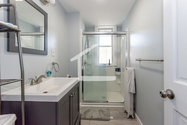 Building Photo - Unique BU Apartment with ridiculous renovations including dinos