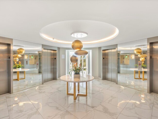 Building Photo - 10275 Collins Ave