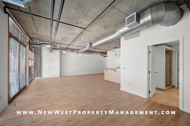 Building Photo - Expansive East Village loft at Parkloft, a...