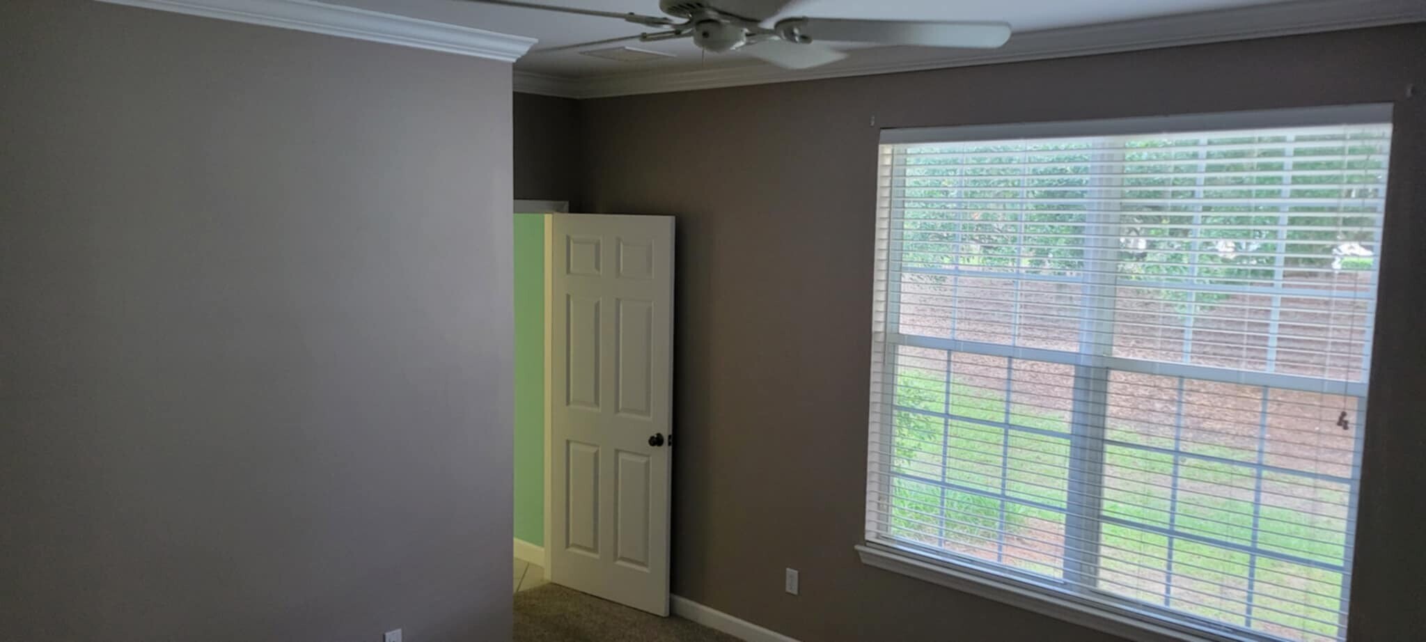 Master Bedroom with view of huge oak tree - 4287 Four Oaks Blvd