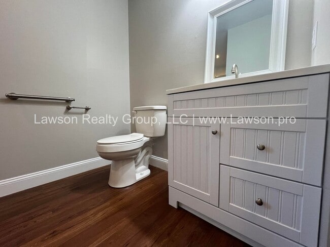 Building Photo - Charming Brick Ranch with Beautifully Landscaped Yard and Attached Carport