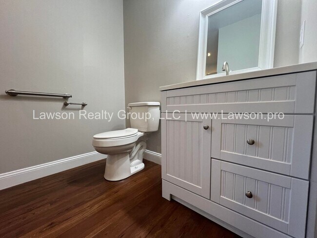 Building Photo - One Level Living- Beautifully Landscaped Yard and Attached Carport