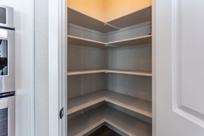 Building Photo - Exceptional 4-Bedroom Home with Dual Fireplaces, Main Level Master Suite, and Spacious Basement -...