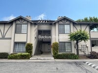 Building Photo - Very nice upstairs two bedroom condo in We...