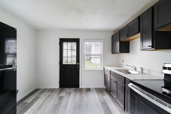 Building Photo - Available in June! 4-Bedroom Townhouse in Scenic Hills Homes - Midland, PA