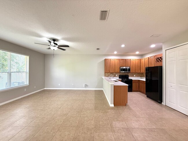 Building Photo - GORGEOUS Two Story 4/3.5 home in sought af...