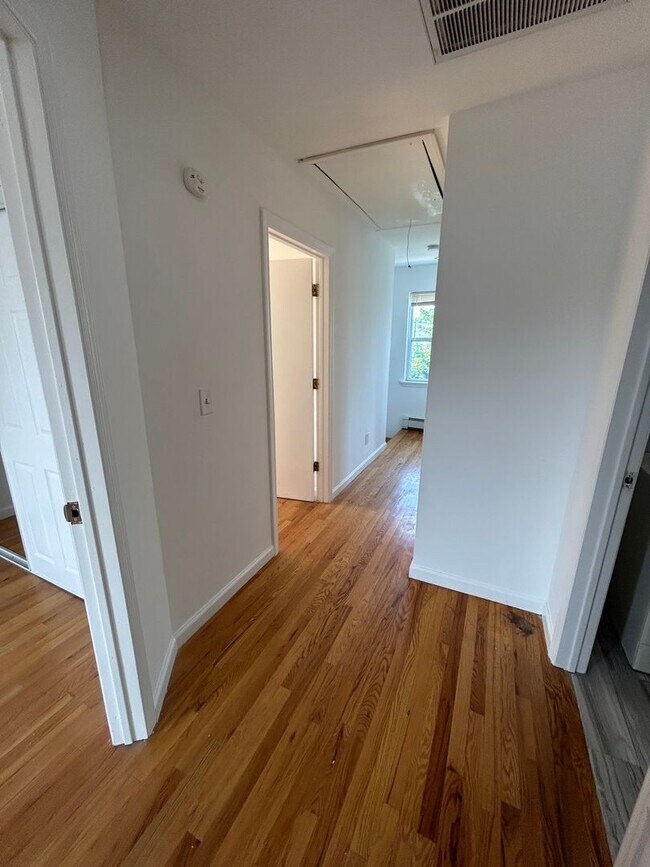 Building Photo - Discover Your Dream Home in Neptune: Spacious 4-Bedroom, 2.5-Bath with Private Backyard and Drive...