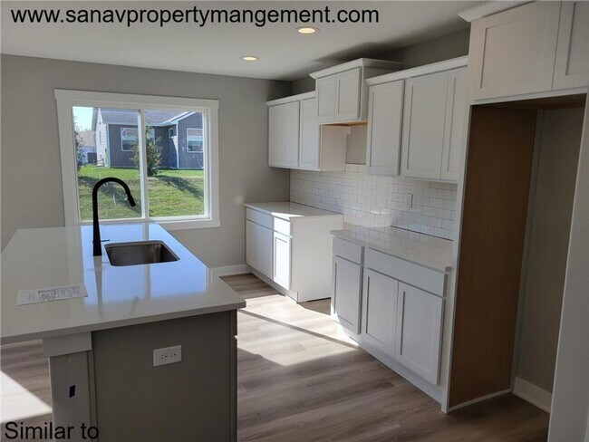 Building Photo - Spacious 4-Bedroom Home – Move-In Ready-Hu...