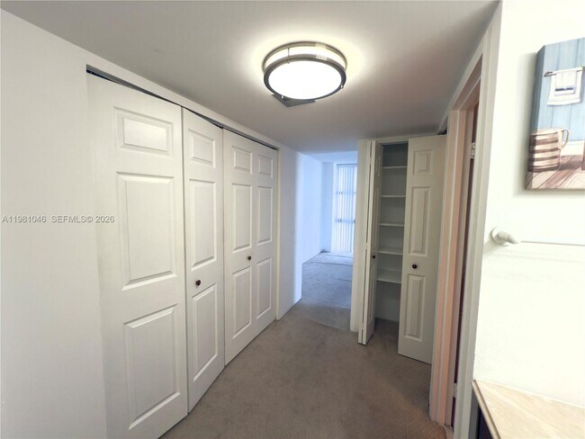 Building Photo - 3675 N Country Club Dr