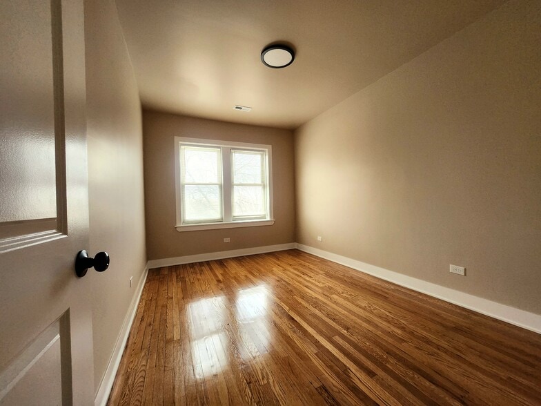 Building Photo - 1359 S Kildare Ave