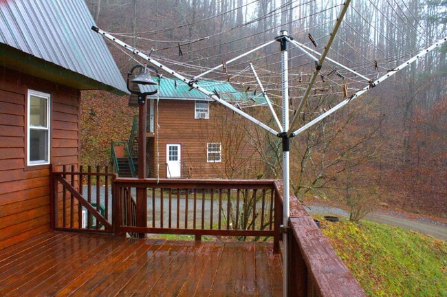 Building Photo - "Charming 2-Bed Retreat with Hardwood Elegance in Scenic Marshall, NC"
