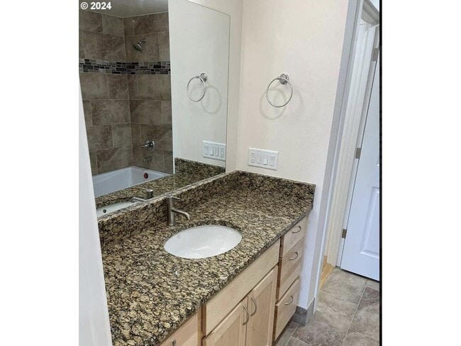 Building Photo - Bright and Airy Home with Stainless Steel Kitchen, Vaulted Ceilings & Washer + Dryer