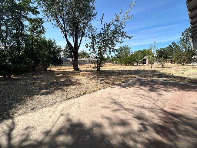 Building Photo - Corner Lot Home w/ Giant Yards, Covered Patio & Minutes to Boise Spectrum Center!
