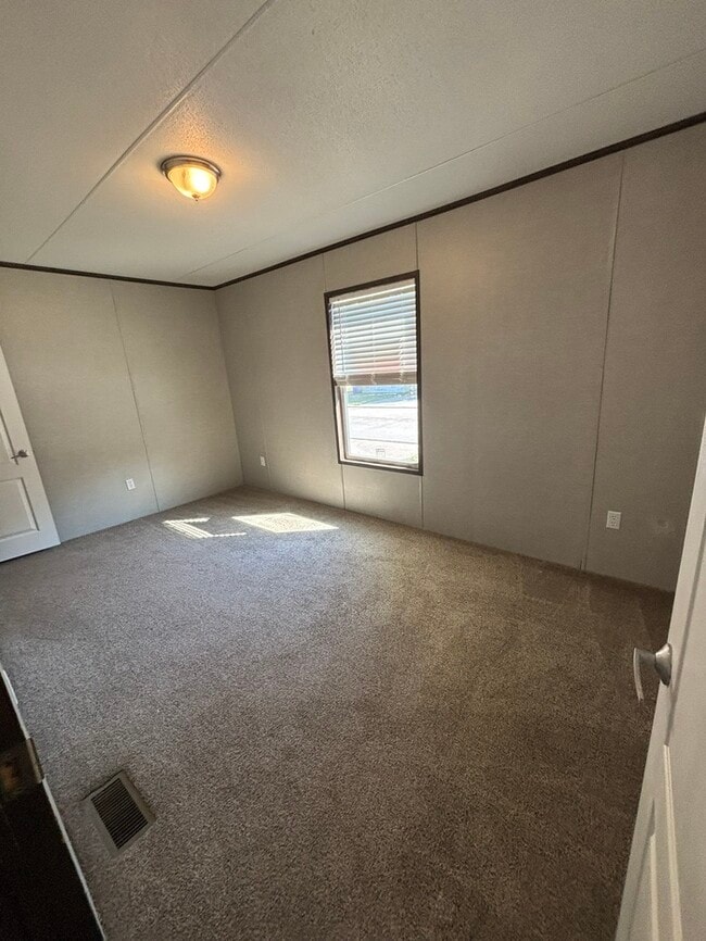 Building Photo - Triangle Mobile Home Park