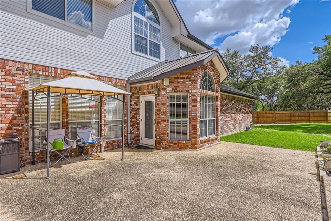 Building Photo - Stunning Home in Guard Gated Community ~ I...