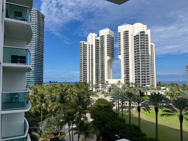 Building Photo - 19370 Collins Ave